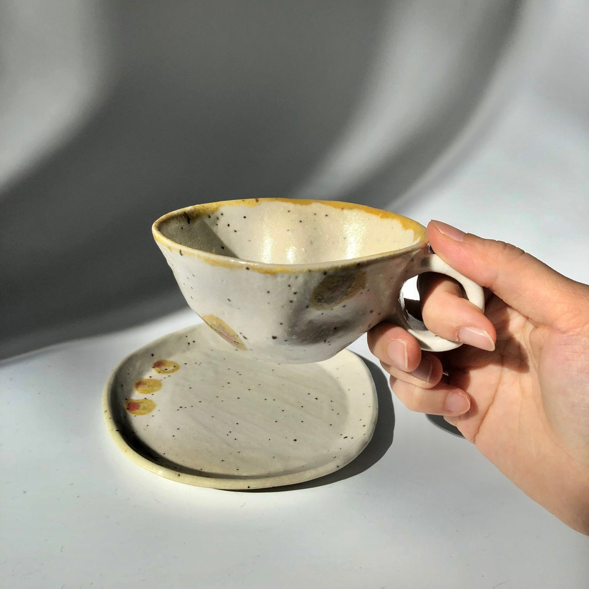 Hiroshi Hirai: Heart Shaped Cup & Saucer Set, Yellow Accents - tokinari.live