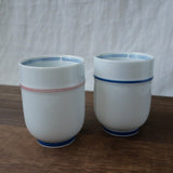 Saikai Ceramics: Red Trim, White Porcelain Yunomi Tea Cup with Blue Accents 150 ml - tokinari.live