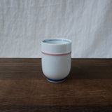 Saikai Ceramics: Red Trim, White Porcelain Yunomi Tea Cup with Blue Accents 150 ml - tokinari.live